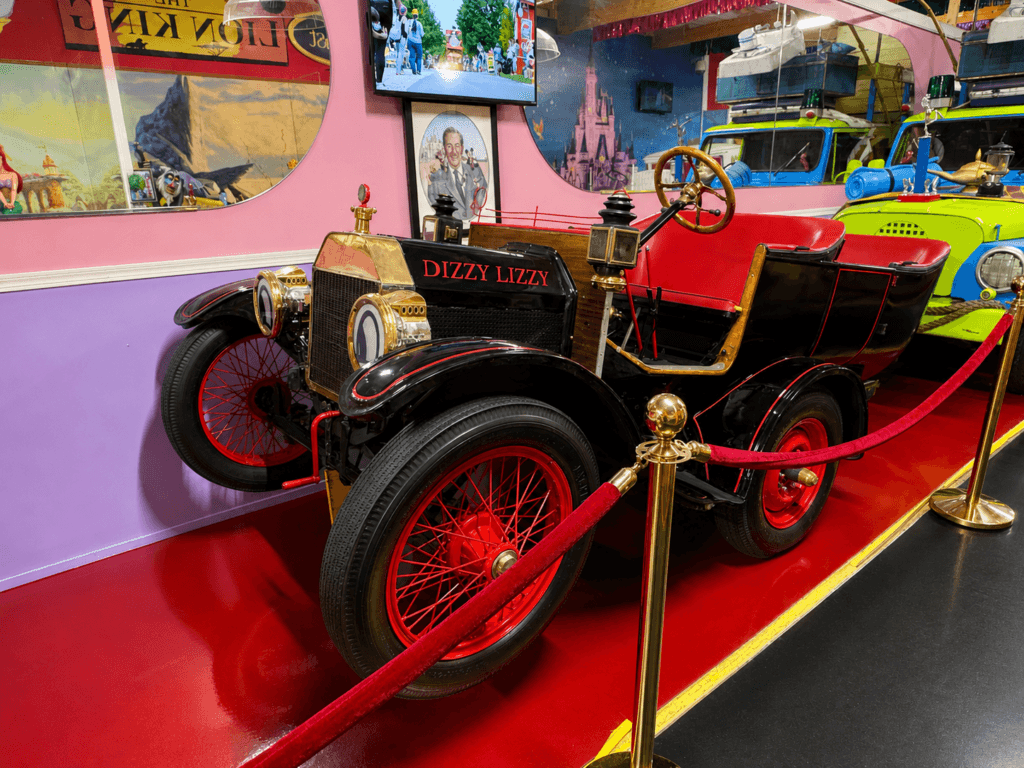 Vintage car displayed in museum setting.