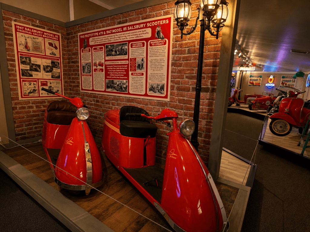 Vintage scooters displayed in a museum