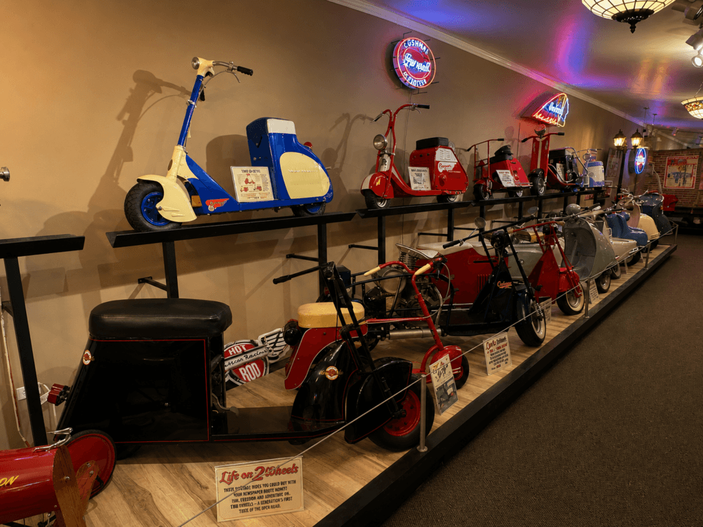 Vintage scooters displayed in a museum