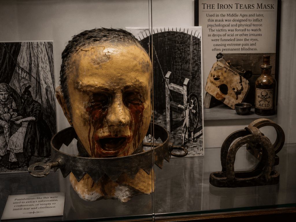 Historical torture mask and devices display