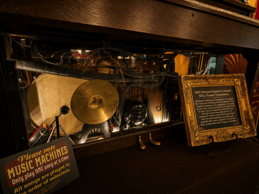 Antique music machine with historical details.