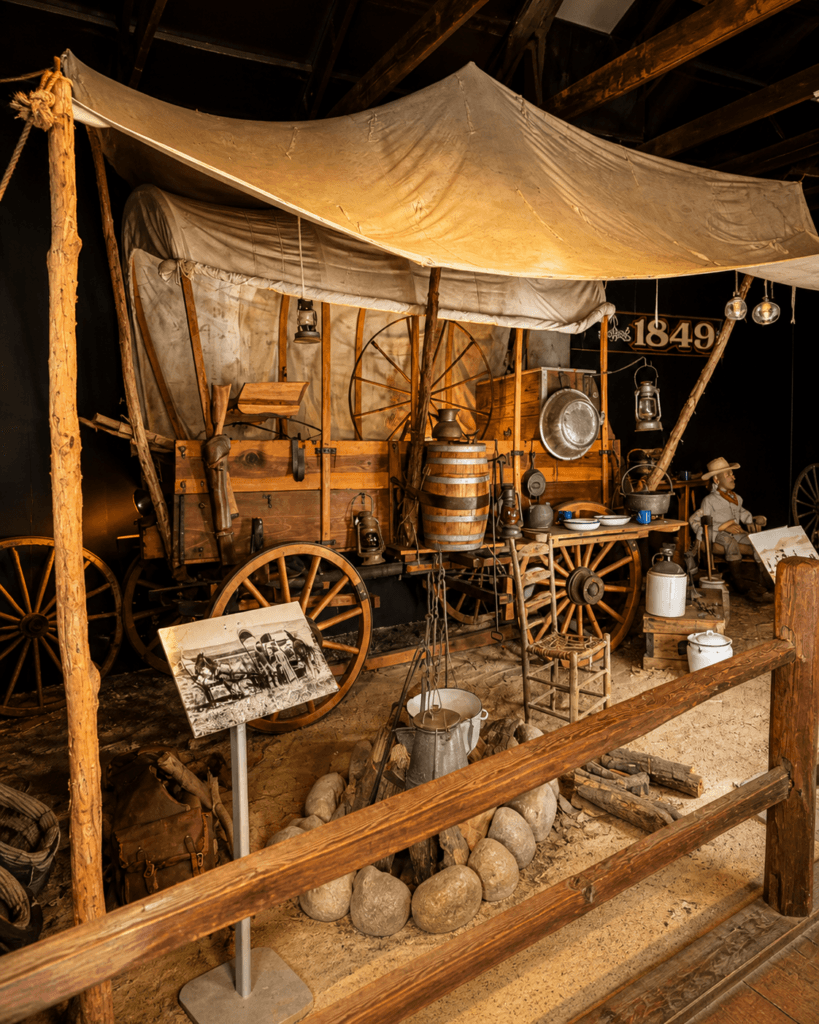 Old wagon with historical artifacts displayed