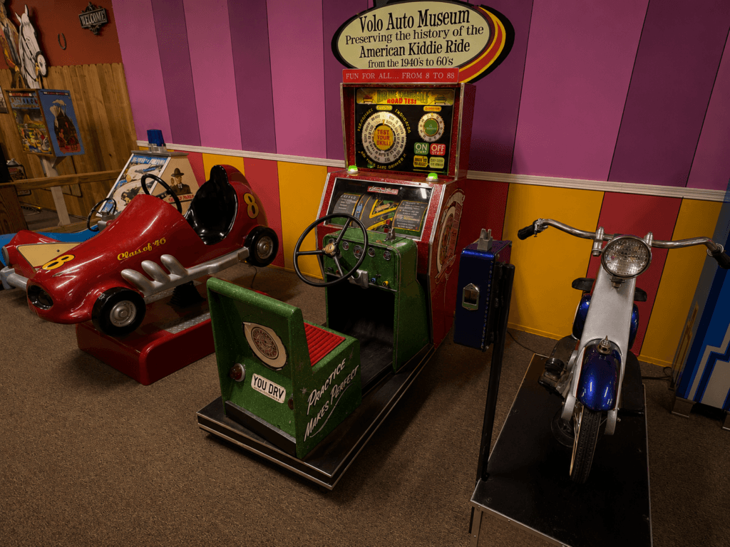 Vintage amusement rides in colorful setting