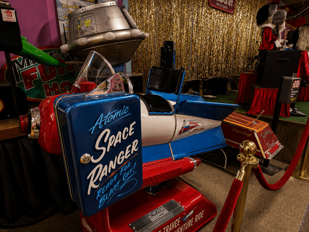 Vintage amusement rides in colorful setting