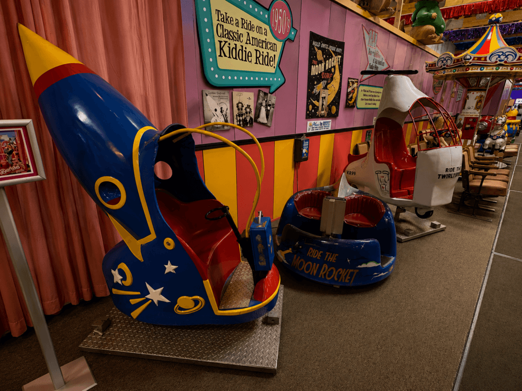 Vintage amusement rides in colorful setting