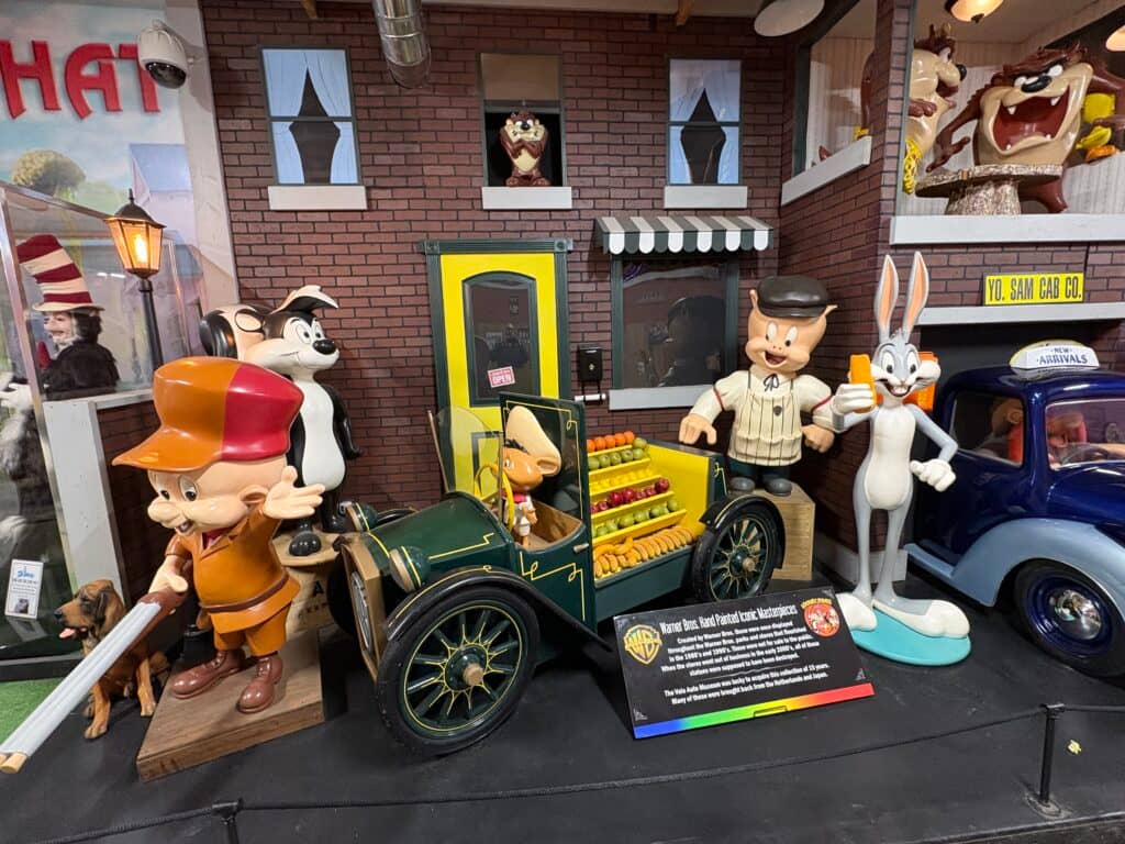 Classic looney tunes cartoon characters with vintage car