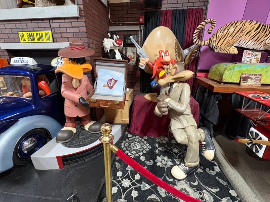 Classic looney tunes cartoon characters with vintage car