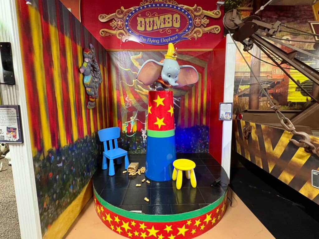 Dumbo themed display with colorful chairs
