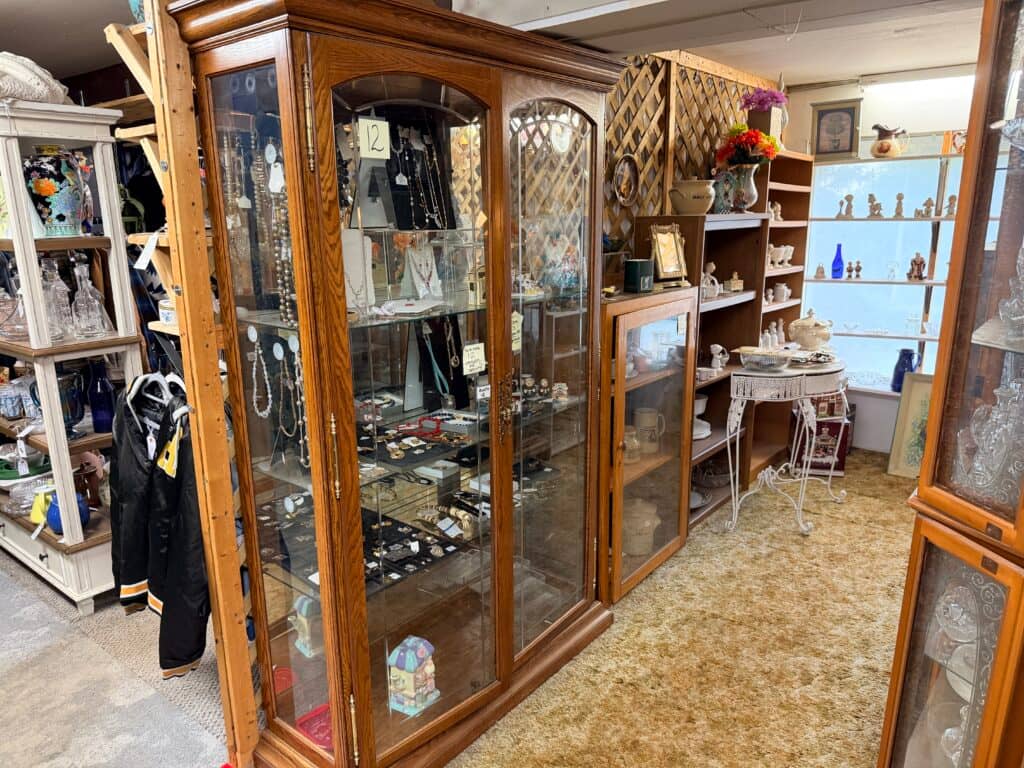 Display cabinets filled with various items.